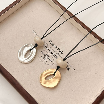 Irregular matte openwork oval pendant long necklace – Sienna Noosa