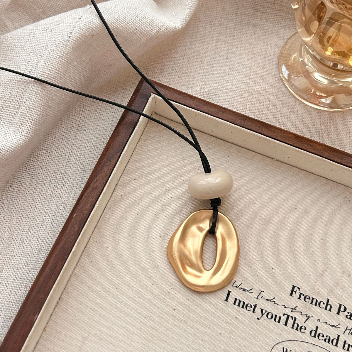 Irregular matte openwork oval pendant long necklace – Sienna Noosa