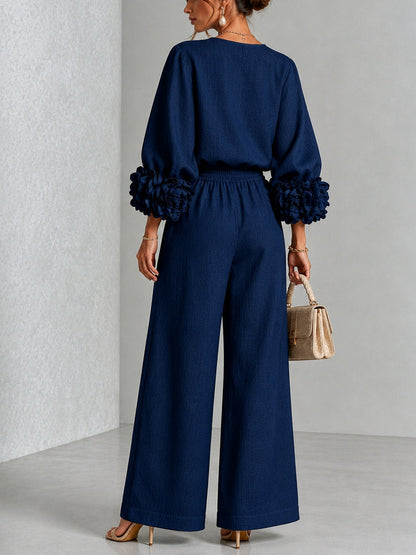 Navy Top Featuring Striking Floral Cuffs Paired with Wide Leg Pants Suit – Sienna Noosa