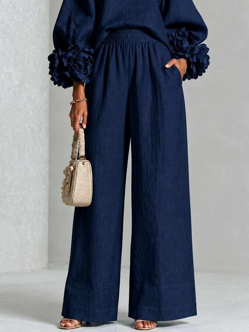 Navy Top Featuring Striking Floral Cuffs Paired with Wide Leg Pants Suit – Sienna Noosa